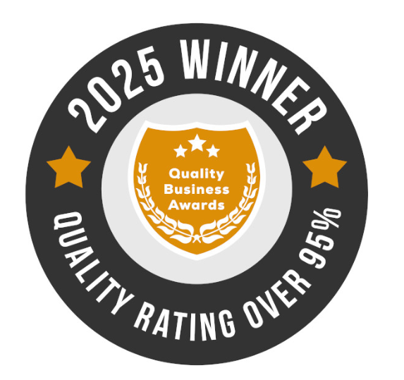 A badge indicating a 2025 winner of the Quality Business Awards with a quality rating over 950%, featuring a central gold shield with three stars and laurel leaves.
